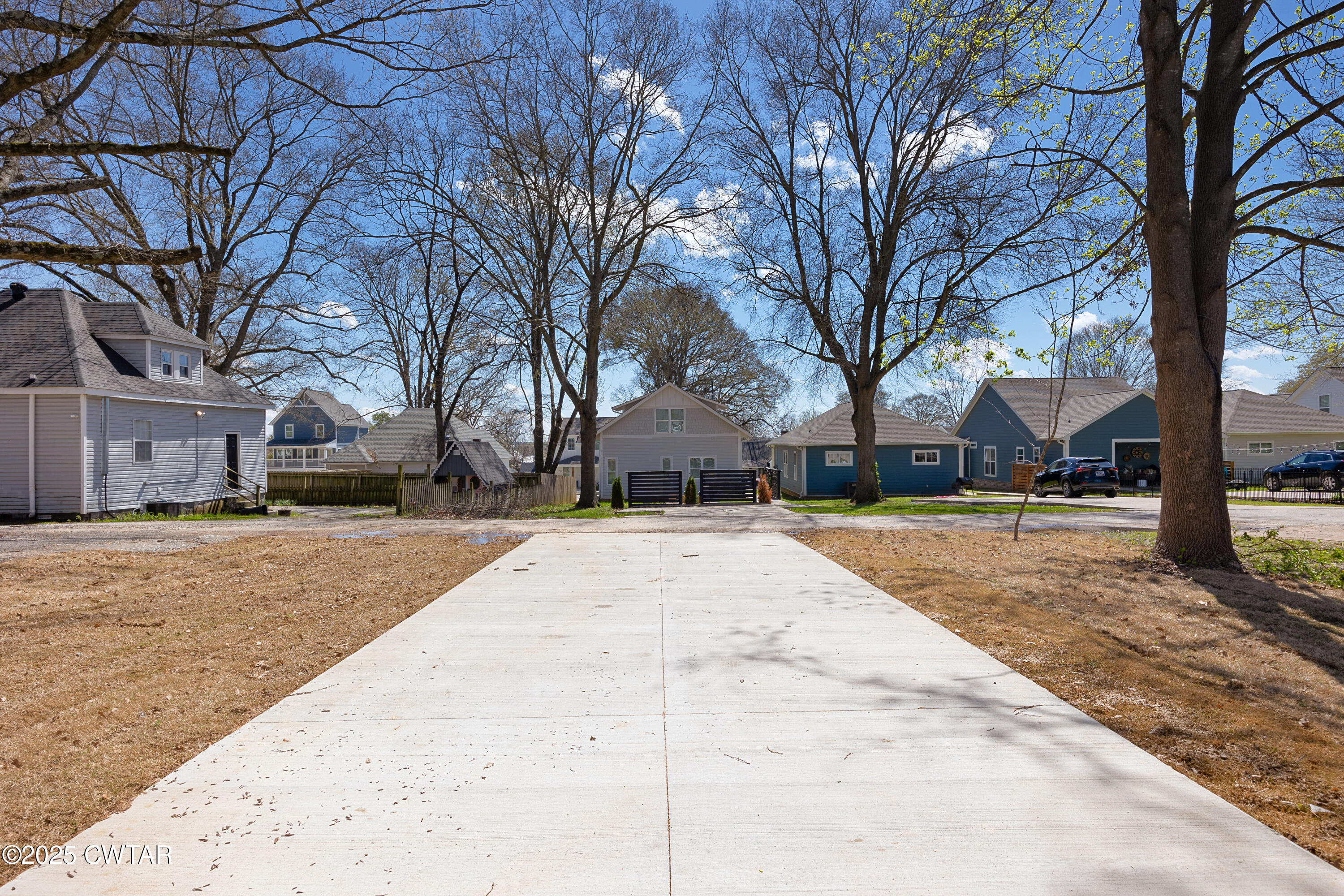 300 West Deaderick Street Jackson, TN 38301 - Photo 3 of 16 a view of outdoor space yard and tree