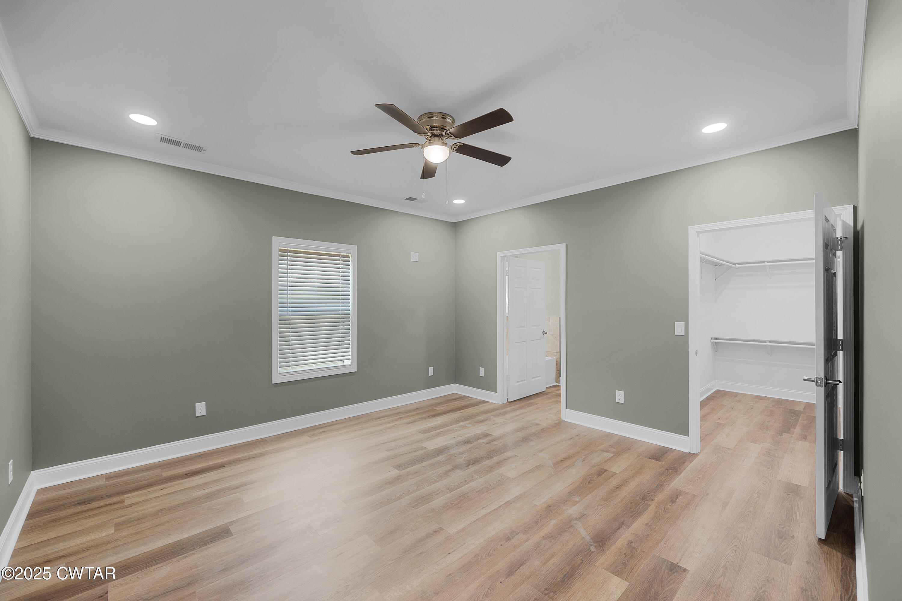 300 West Deaderick Street Jackson, TN 38301 - Photo 5 of 16 a view of an empty room with a window
