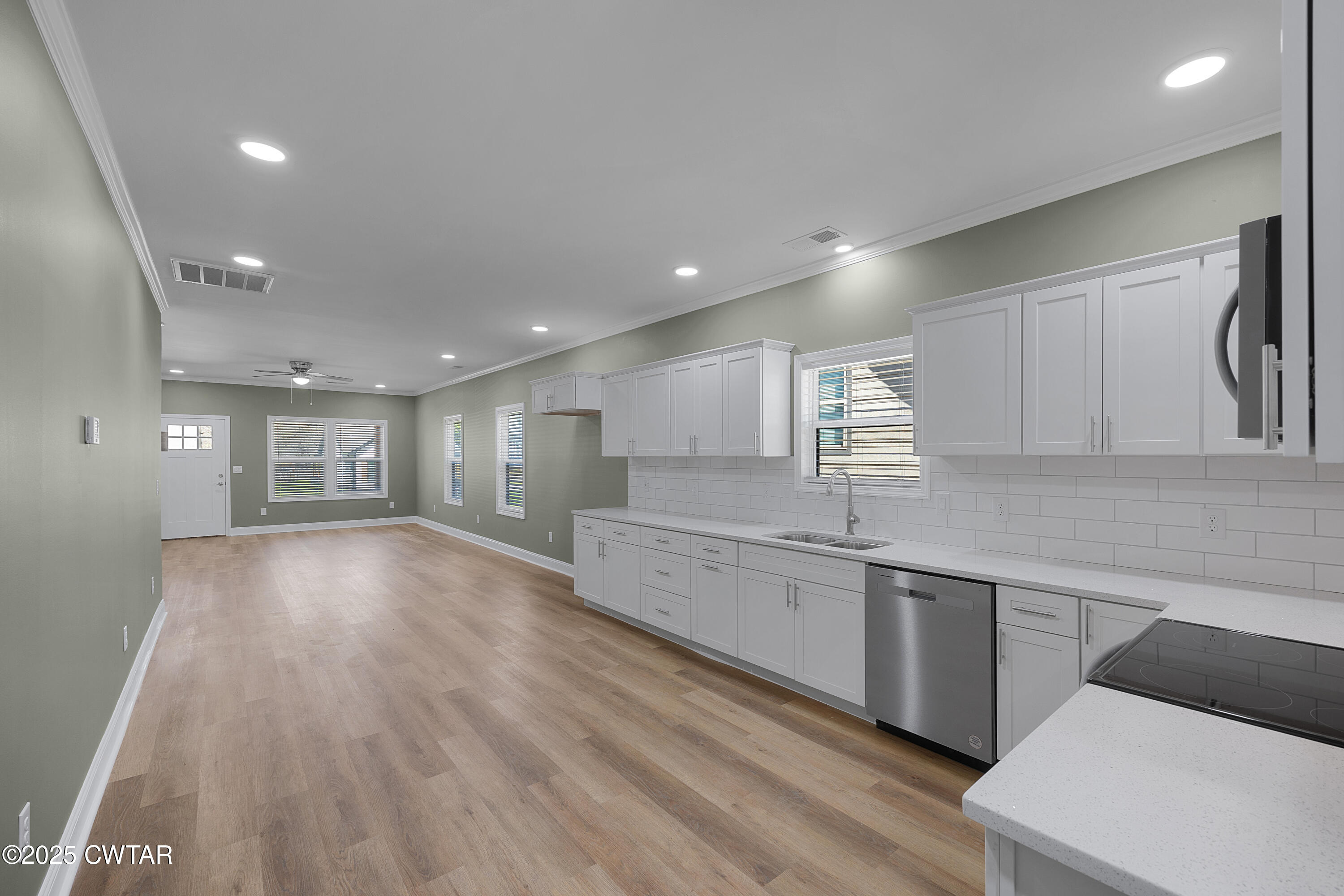 300 West Deaderick Street Jackson, TN 38301 - Photo 8 of 16 a view of an empty room and window