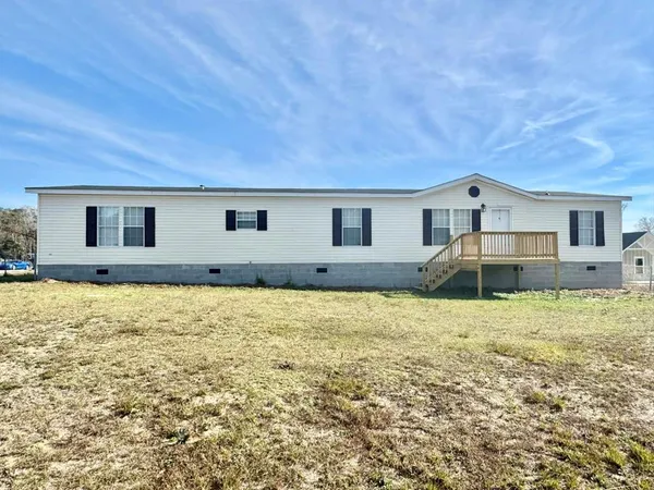 a house view with a garden space