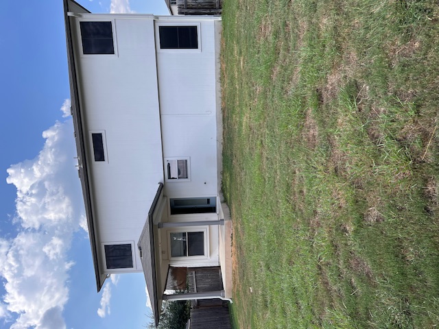 922 Gentry Drive Leander, TX 78641 - Photo 18 of 19 Rear view of property with a patio