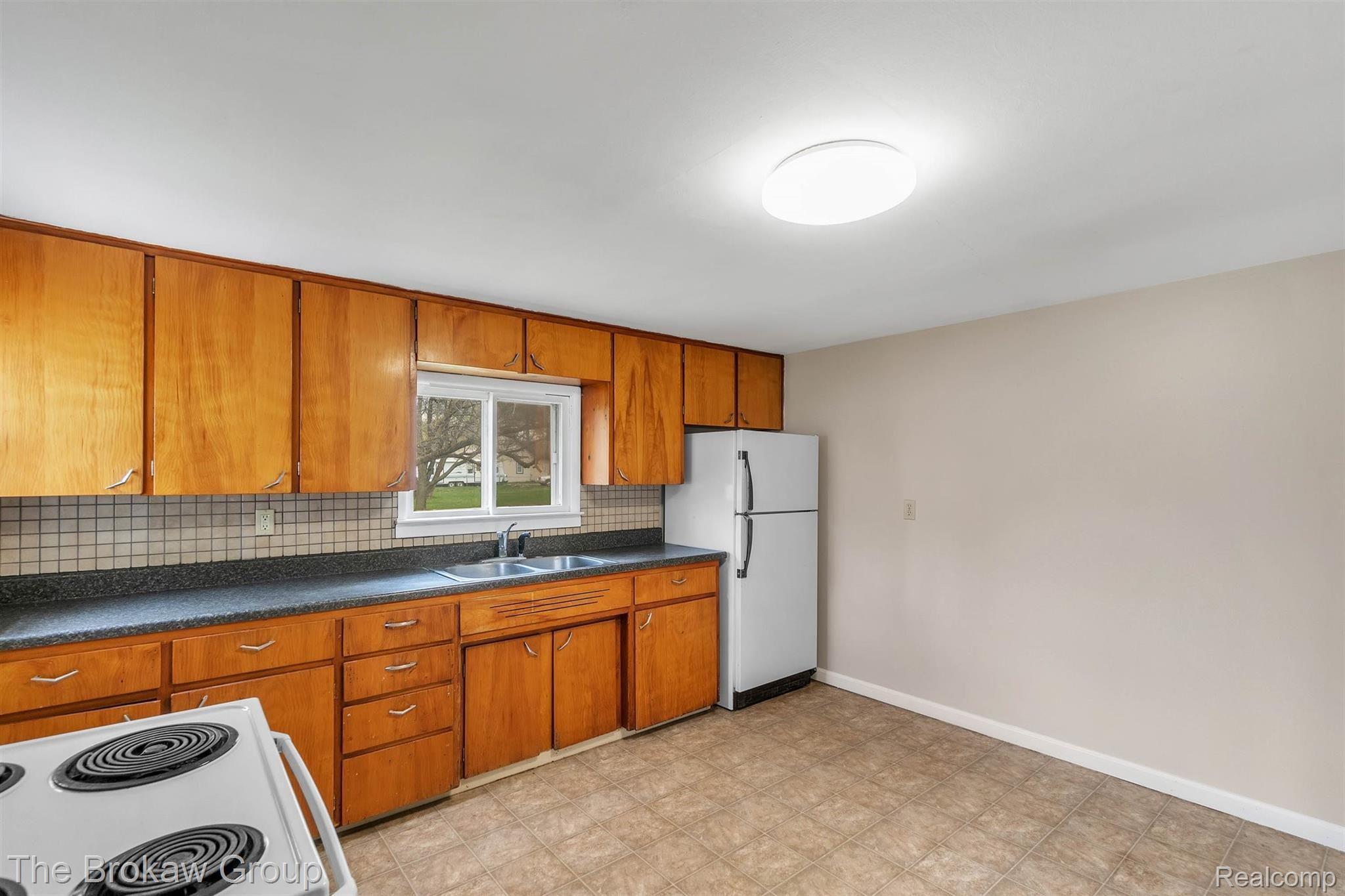 1057 Adams Road Burton, MI 48509 - Photo 11 of 27 11-1057 Adams-WindowStill-Real-Estate-Photography-11.jpg