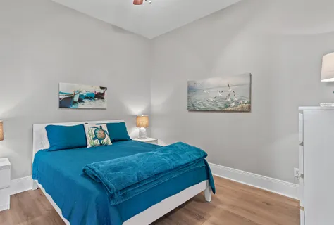 a bedroom with a bed and a couch