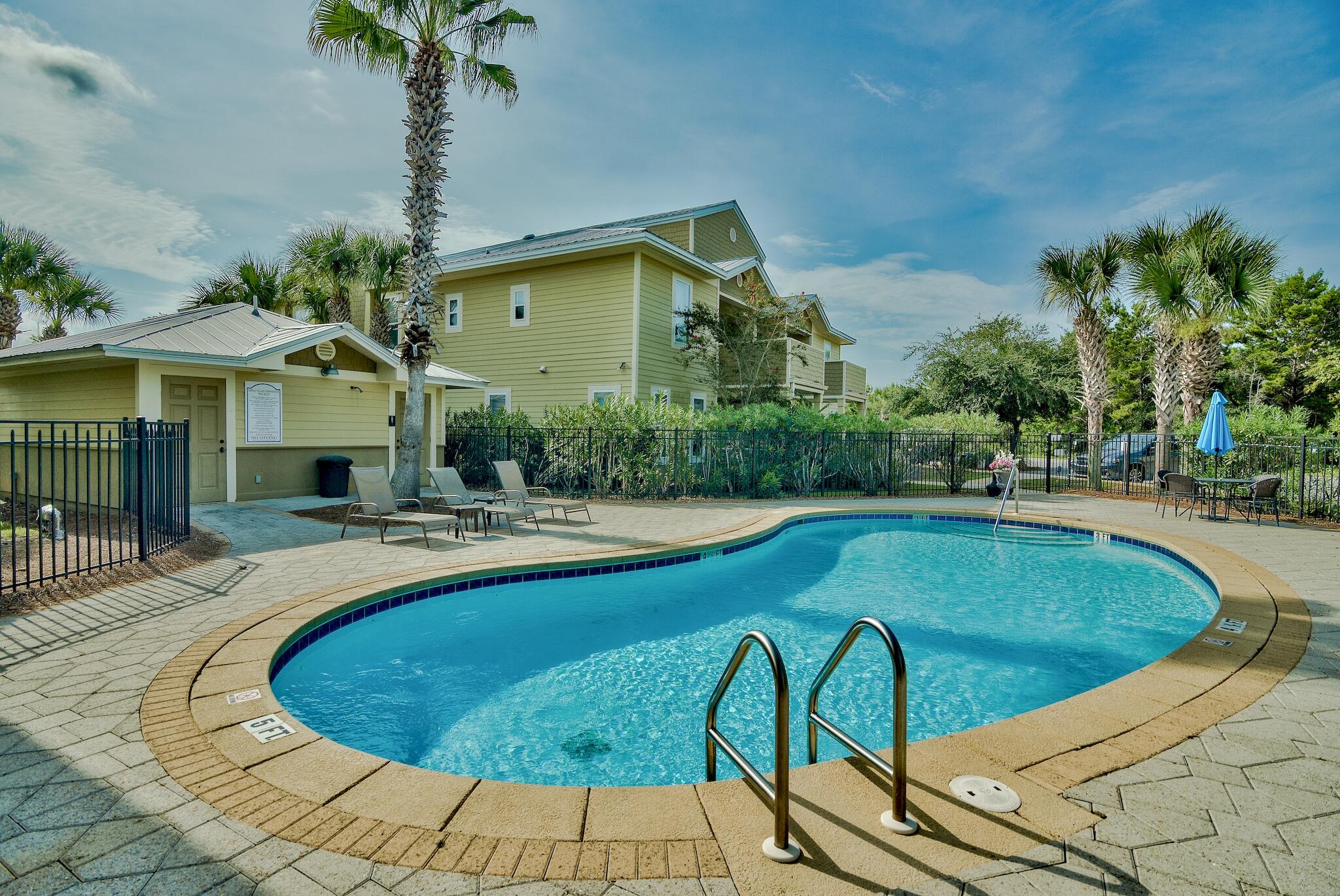 122 Shorebird Drive, Unit 814 Santa Rosa Beach, FL 32459 - Photo 24 of 25 a view of a swimming pool with a patio
