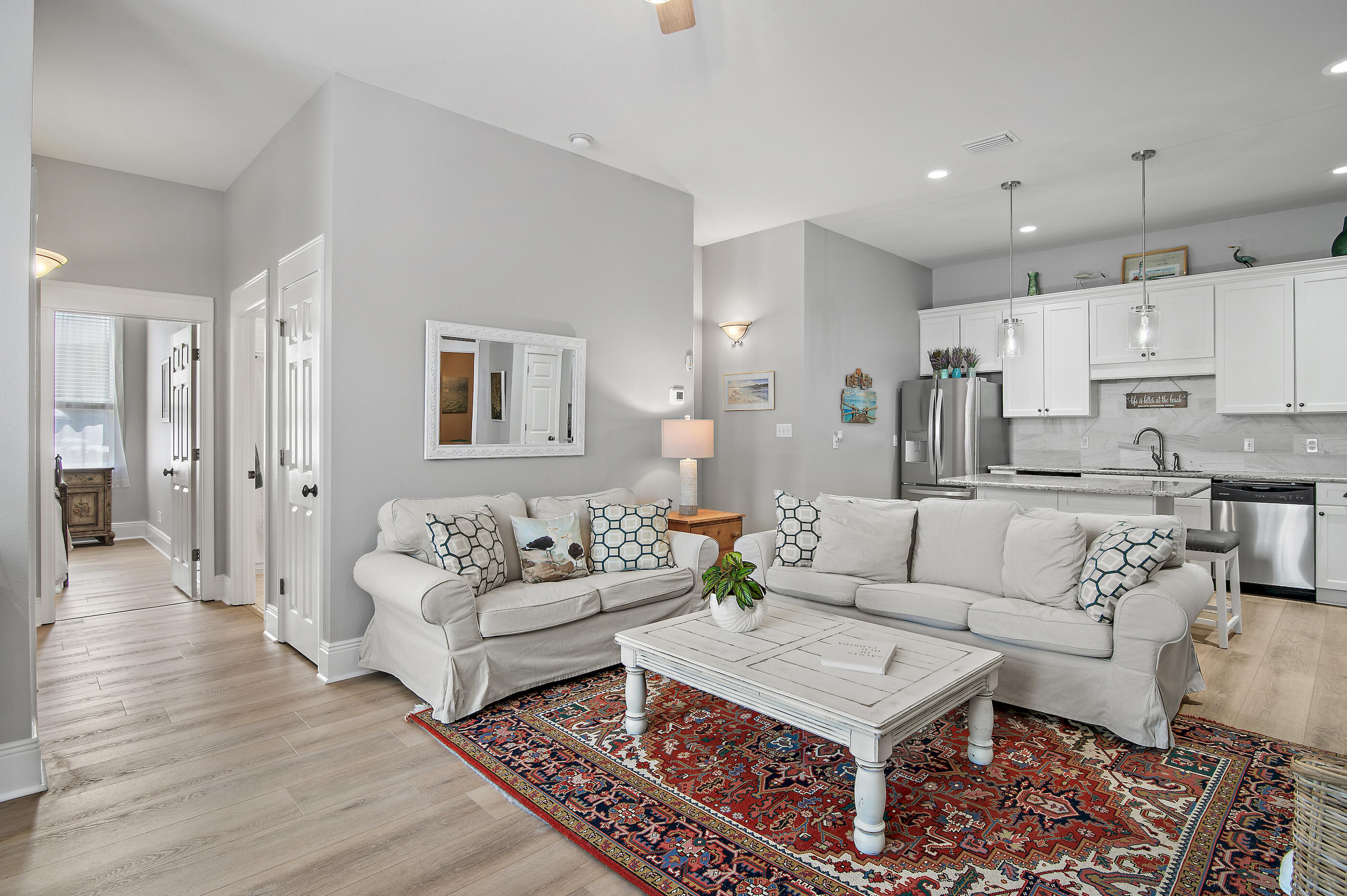 122 Shorebird Drive, Unit 814 Santa Rosa Beach, FL 32459 - Photo 8 of 25 a living room with furniture and a wooden floor