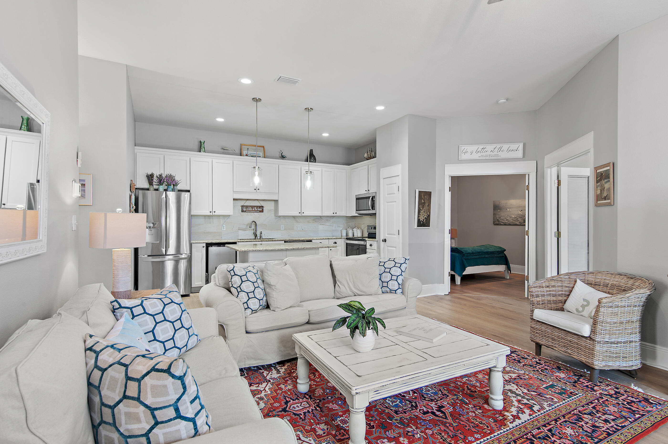 122 Shorebird Drive, Unit 814 Santa Rosa Beach, FL 32459 - Photo 9 of 25 a living room with furniture and kitchen view
