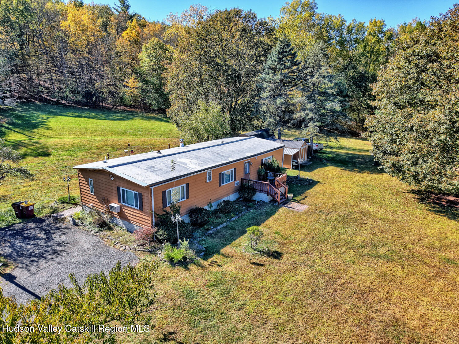 626 Bross Street Cairo, NY 12413 - Photo 5 of 78 a view of a house with pool and a yard