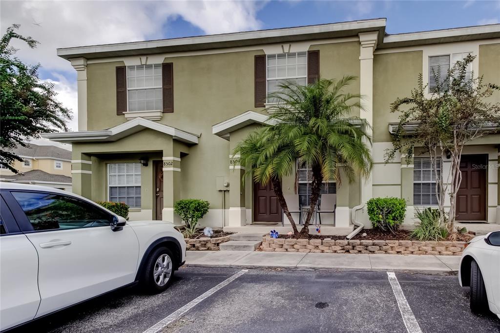 8504 Gablebend Way Tampa, FL 33647 - Photo 1 of 34 a front view of a house with garden