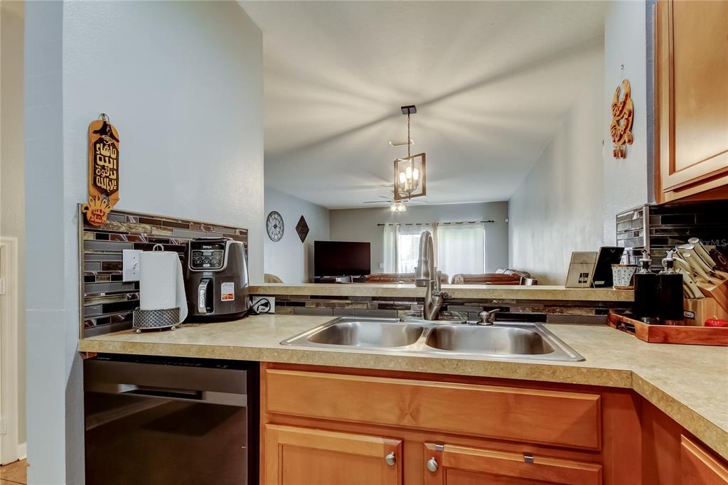 8504 Gablebend Way Tampa, FL 33647 - Photo 13 of 34 a kitchen with lots of counter top space and a sink