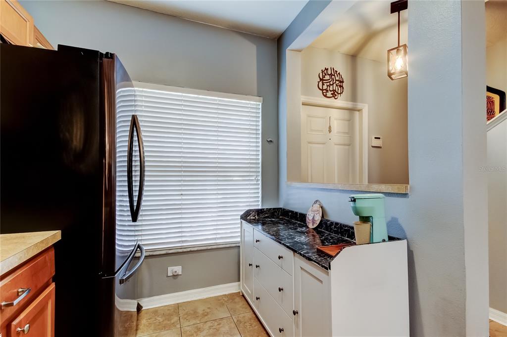 8504 Gablebend Way Tampa, FL 33647 - Photo 17 of 34 a bathroom with a granite countertop sink and a mirror