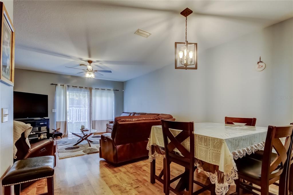 8504 Gablebend Way Tampa, FL 33647 - Photo 3 of 34 a view of a livingroom with furniture and a flat screen tv