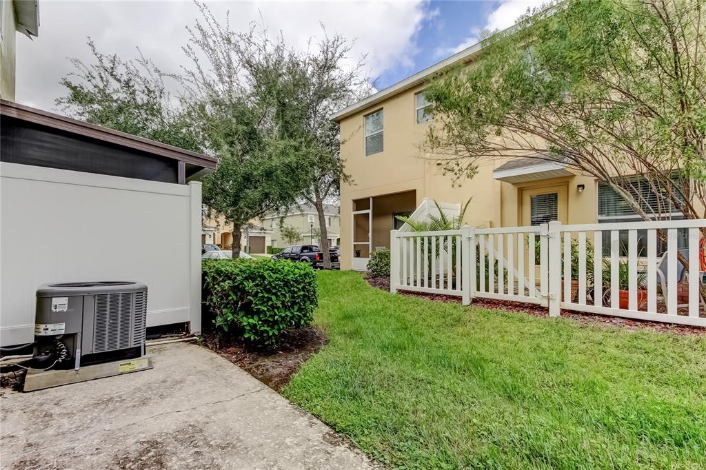 8504 Gablebend Way Tampa, FL 33647 - Photo 31 of 34 a view of a house with a yard and deck