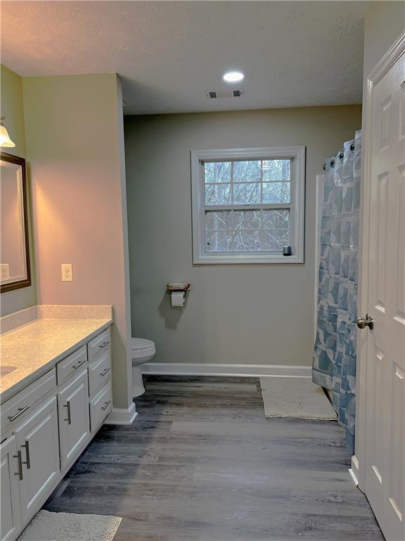 3735 Warwick Way Snellville, GA 30039 - Photo 18 of 28 a bathroom with a sink and a mirror