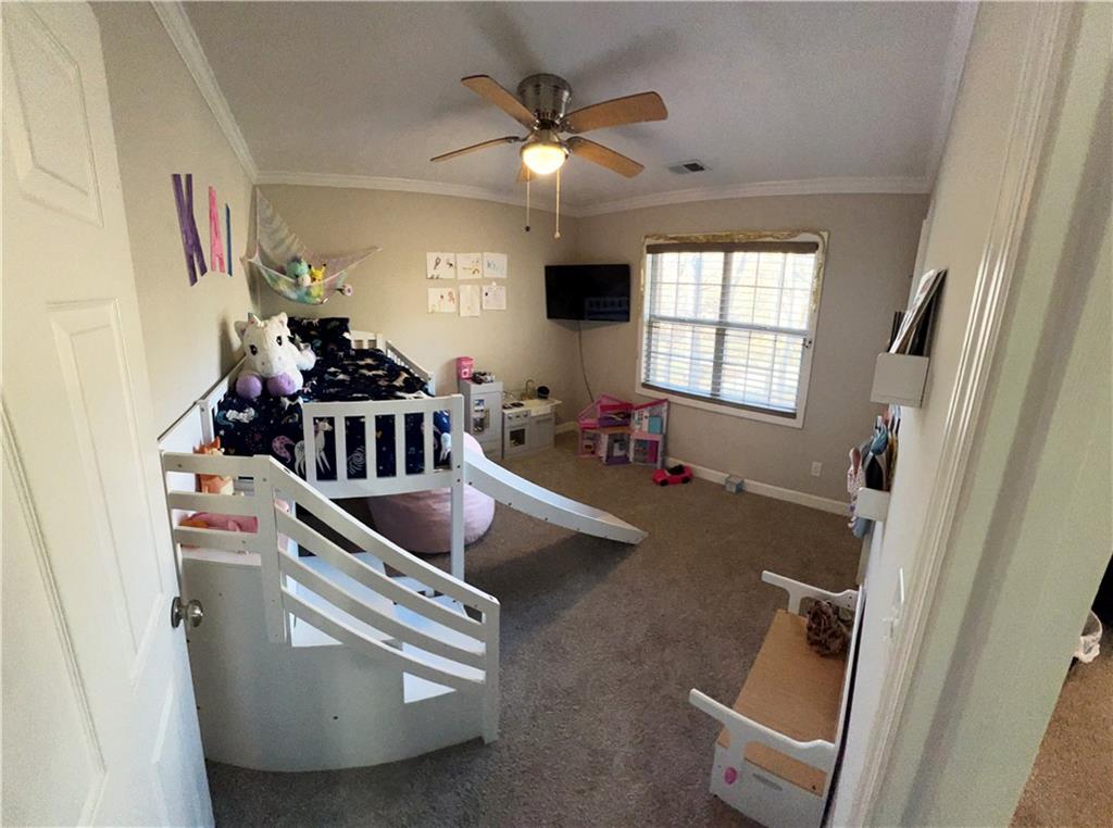 3735 Warwick Way Snellville, GA 30039 - Photo 23 of 28 a living room with furniture and a window