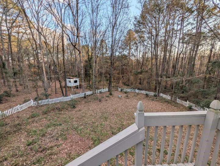 3735 Warwick Way Snellville, GA 30039 - Photo 27 of 28 a view of a backyard with wooden fence