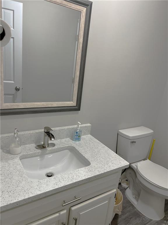 3735 Warwick Way Snellville, GA 30039 - Photo 4 of 28 a bathroom with a sink and a toilet