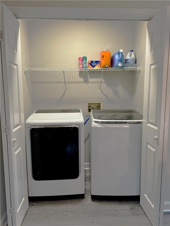 3735 Warwick Way Snellville, GA 30039 - Photo 10 of 28 a utility room with dryer and washer