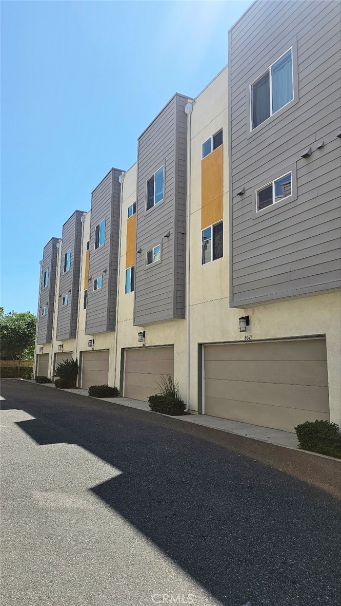 8073 Ackerman Street Buena Park, CA 90621 - Photo 31 of 43 a view of a building with a street