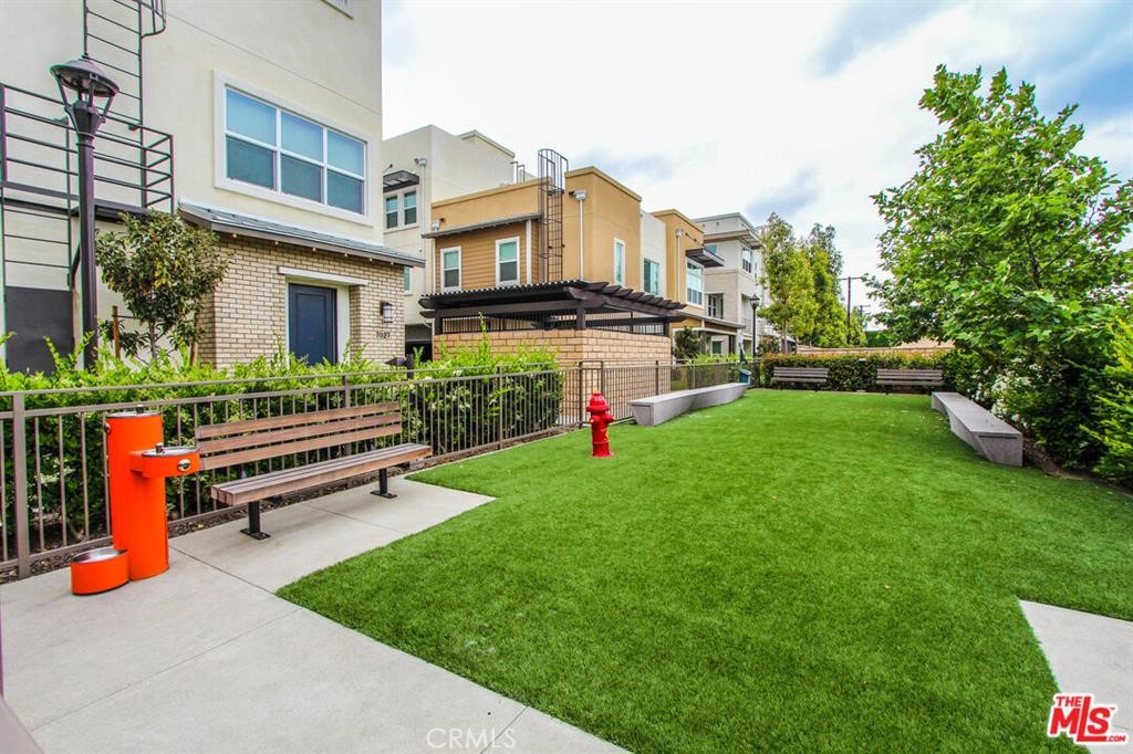 8073 Ackerman Street Buena Park, CA 90621 - Photo 35 of 43 a view of a house with a back yard
