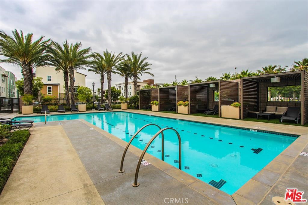 8073 Ackerman Street Buena Park, CA 90621 - Photo 41 of 43 a swimming pool with outdoor seating and yard