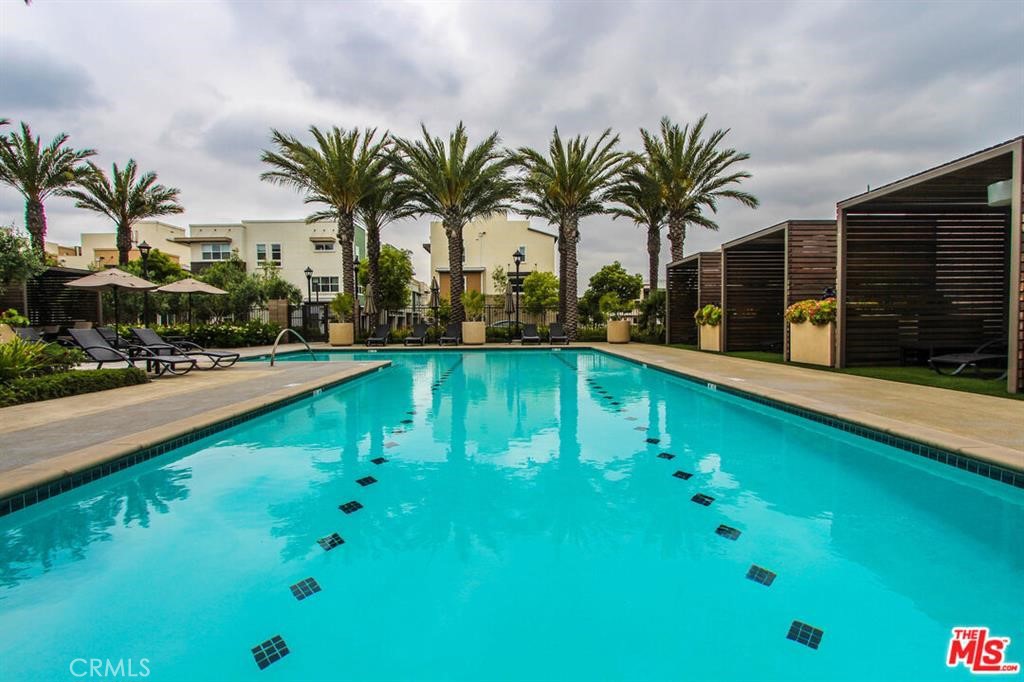 8073 Ackerman Street Buena Park, CA 90621 - Photo 42 of 43 a swimming pool with outdoor seating