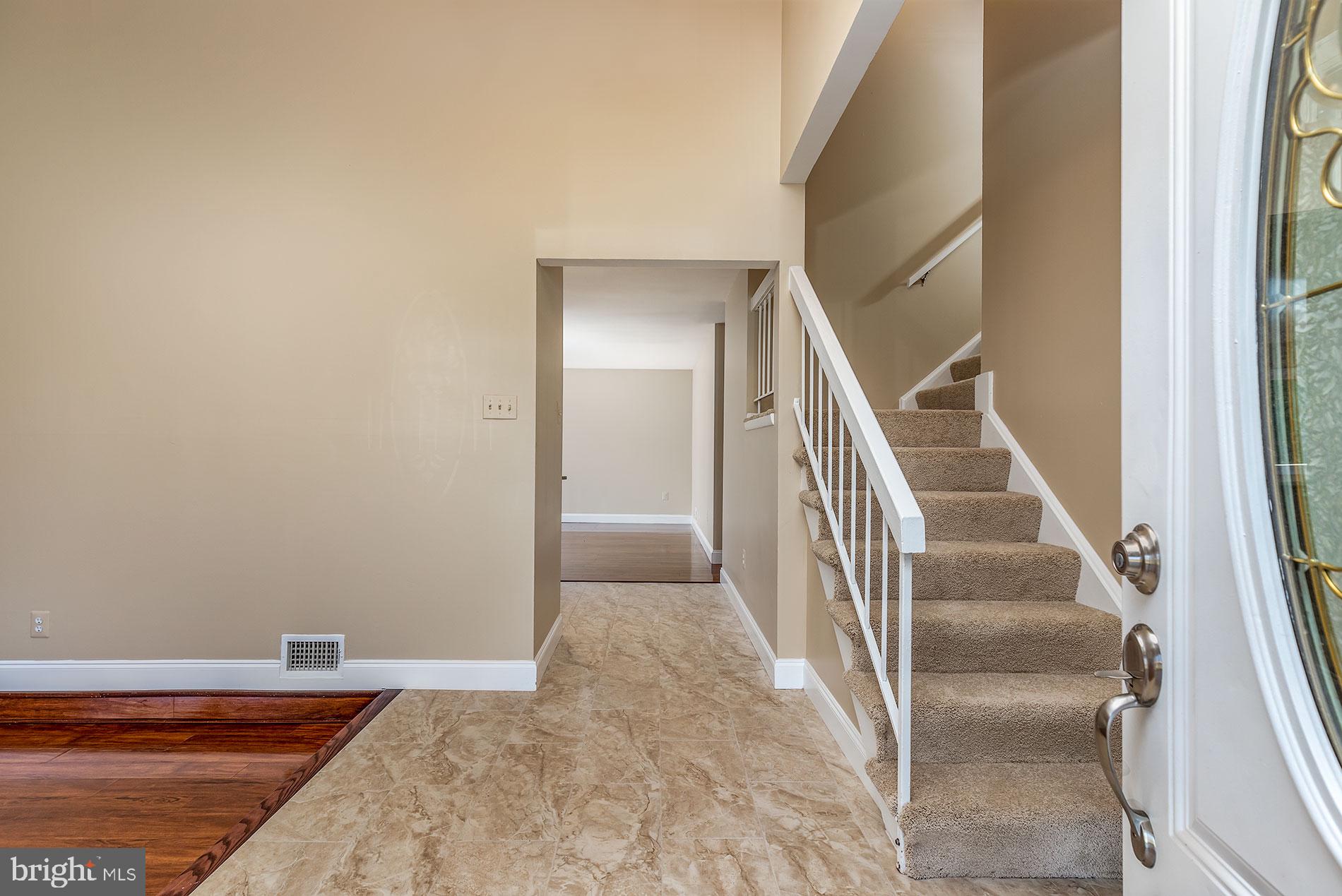 114 South Fox Road Sterling, VA 20164 - Photo 3 of 30 DRAMATIC ENTRY W/NEW TILE FLOORS!
