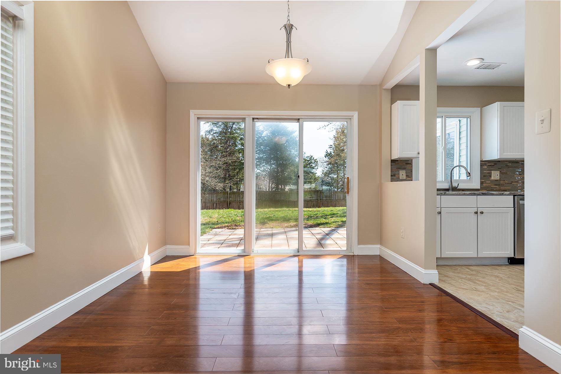 114 South Fox Road Sterling, VA 20164 - Photo 7 of 30 DINING ROOM W/SLIDERS TO PATIO