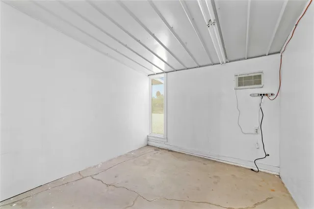 a view of a room with racks on the wall