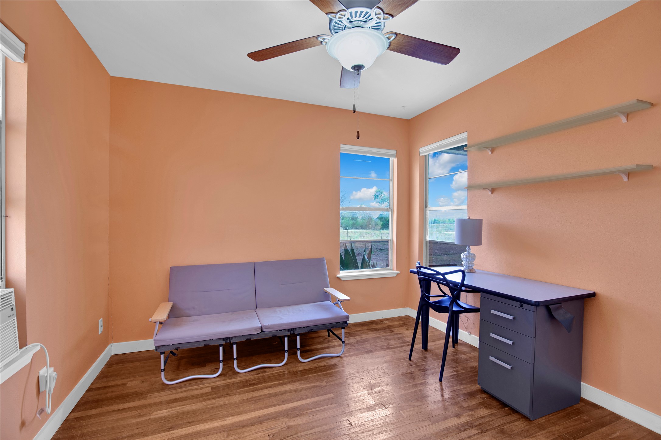 1607 East 4th Street Taylor, TX 76574 - Photo 14 of 32 Home office featuring light wood-type flooring and ceiling fan