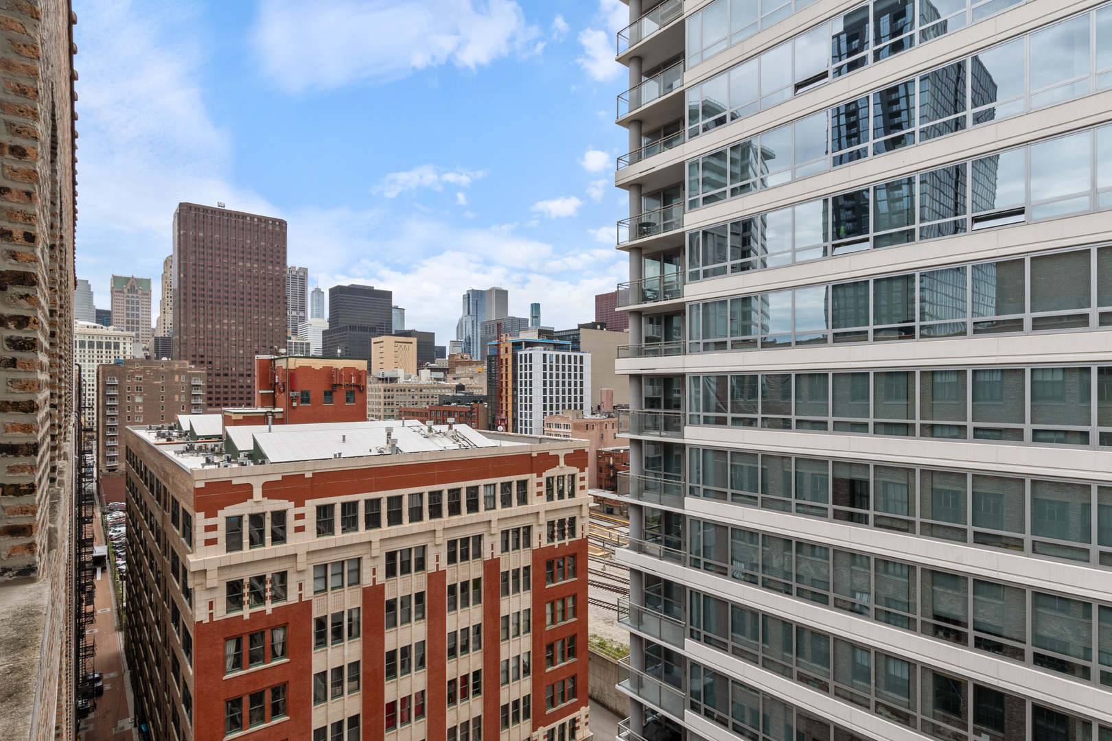 801 South Wells Street, Unit 1006 Chicago, IL 60607 - Photo 20 of 25 a tall building with a city view