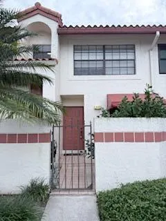 a front view of a house with a garage