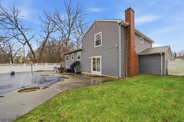 a view of a yard with brick house