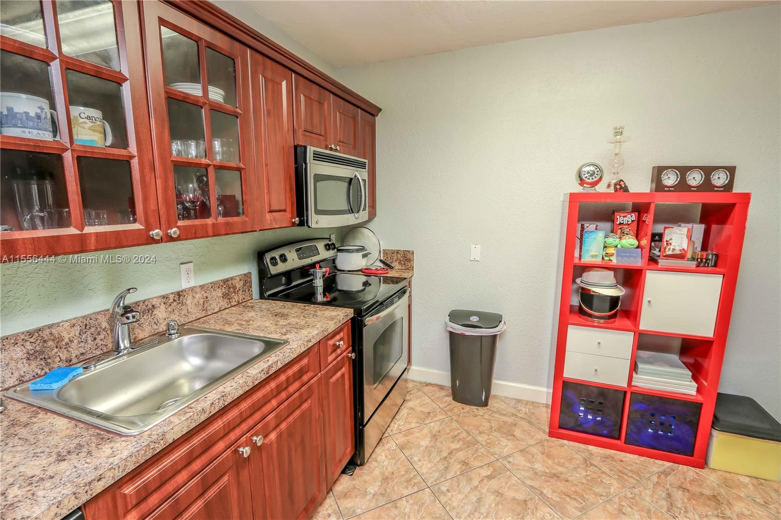 5635 Southwest 5th Terrace Miami, FL 33134 - Photo 12 of 28 a utility room with a sink a washer and dryer