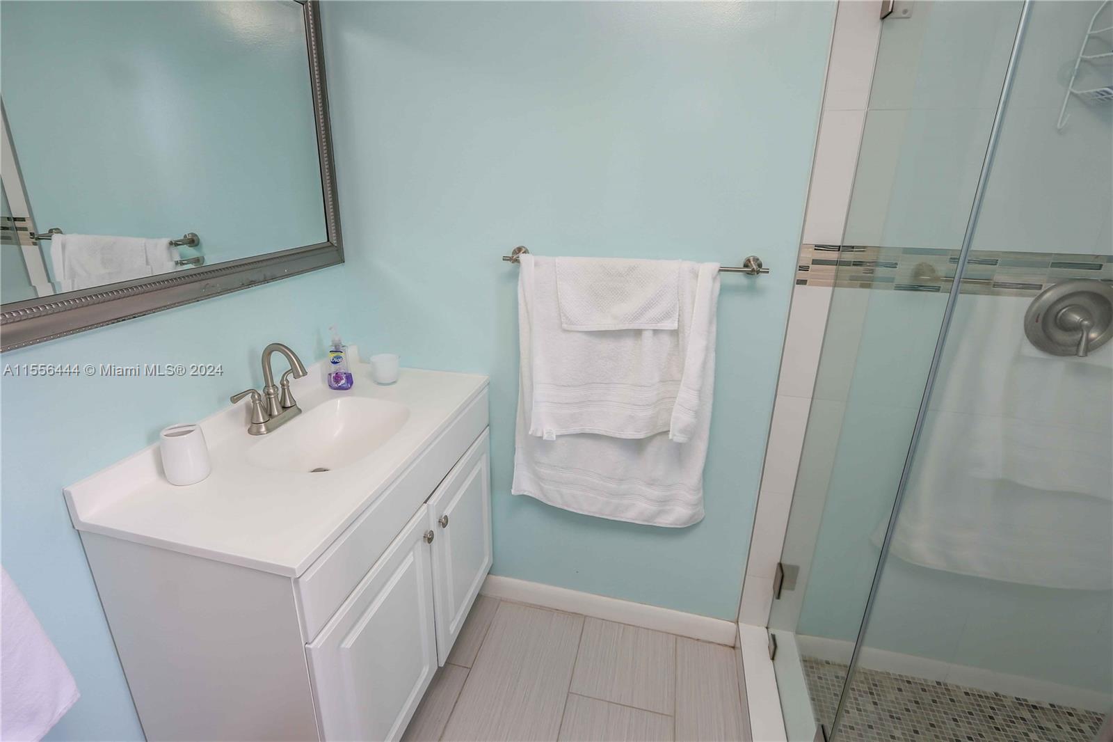 5635 Southwest 5th Terrace Miami, FL 33134 - Photo 17 of 28 a utility room with a sink a washer and dryer