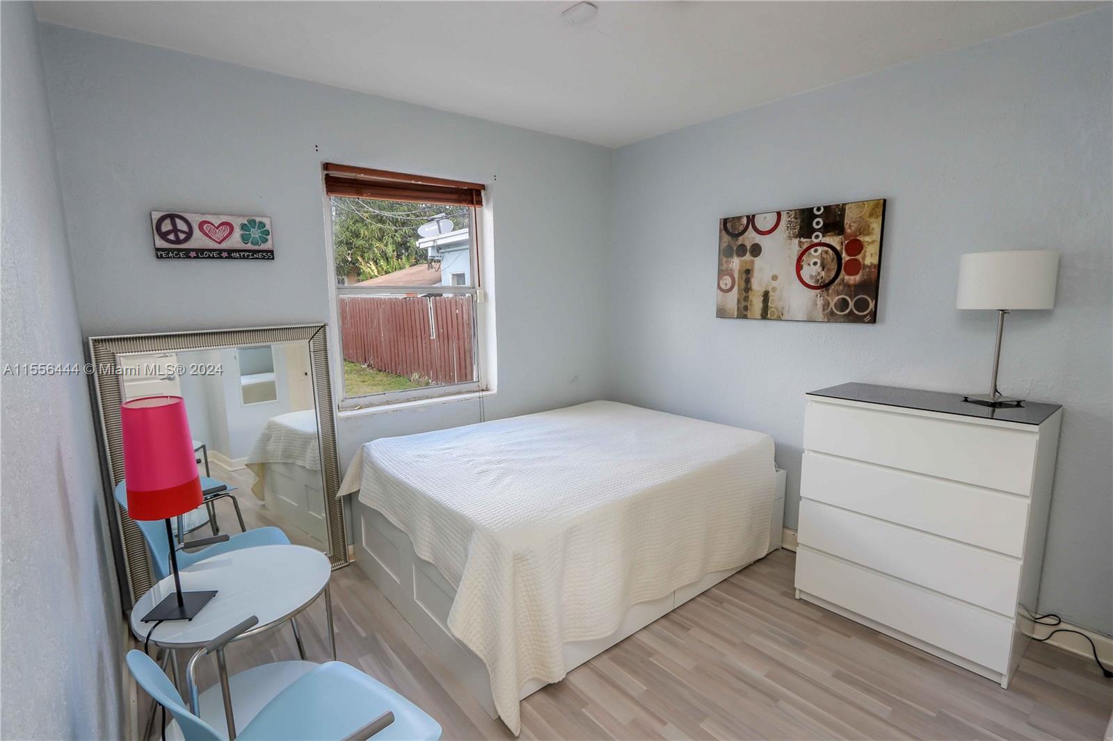 5635 Southwest 5th Terrace Miami, FL 33134 - Photo 18 of 28 a bedroom with a bed and a desk