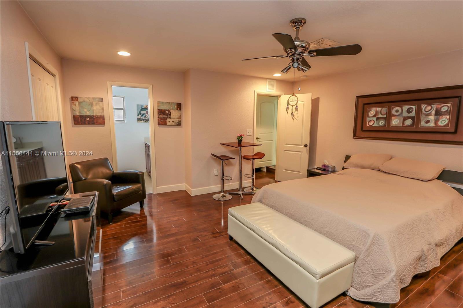 5635 Southwest 5th Terrace Miami, FL 33134 - Photo 24 of 28 a bed room with a bed and a chair