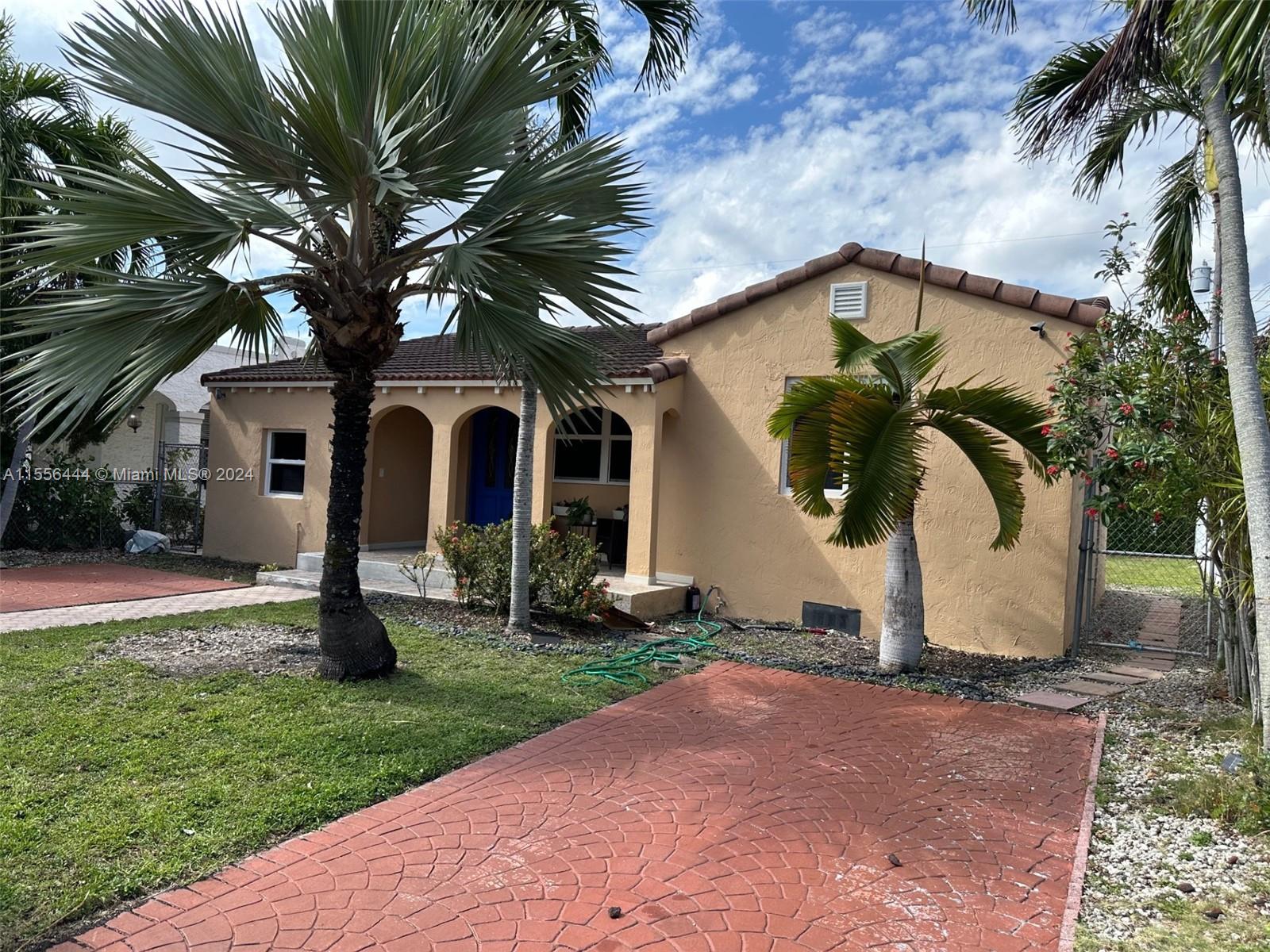 5635 Southwest 5th Terrace Miami, FL 33134 - Photo 3 of 28 a view of a house with a yard
