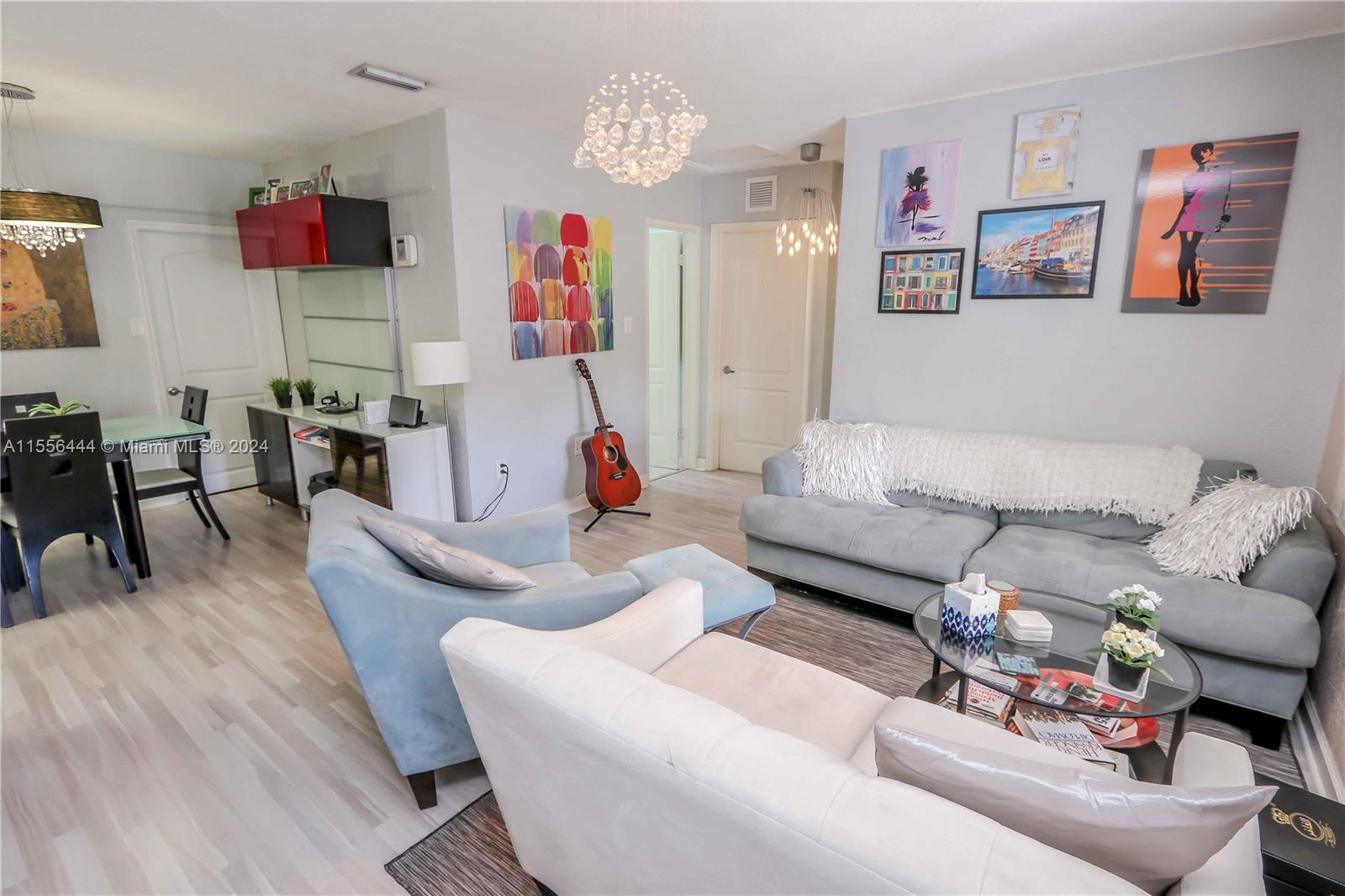 5635 Southwest 5th Terrace Miami, FL 33134 - Photo 6 of 28 a living room with furniture and wooden floor