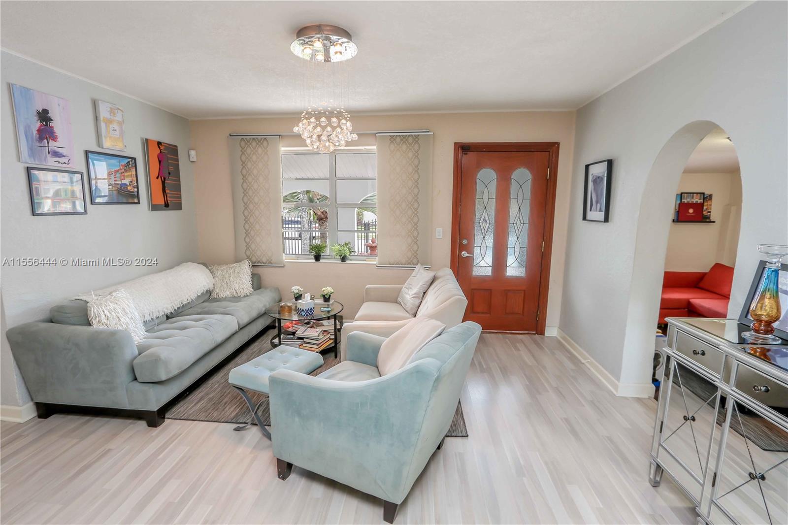 5635 Southwest 5th Terrace Miami, FL 33134 - Photo 9 of 28 a living room with furniture and a flat screen tv