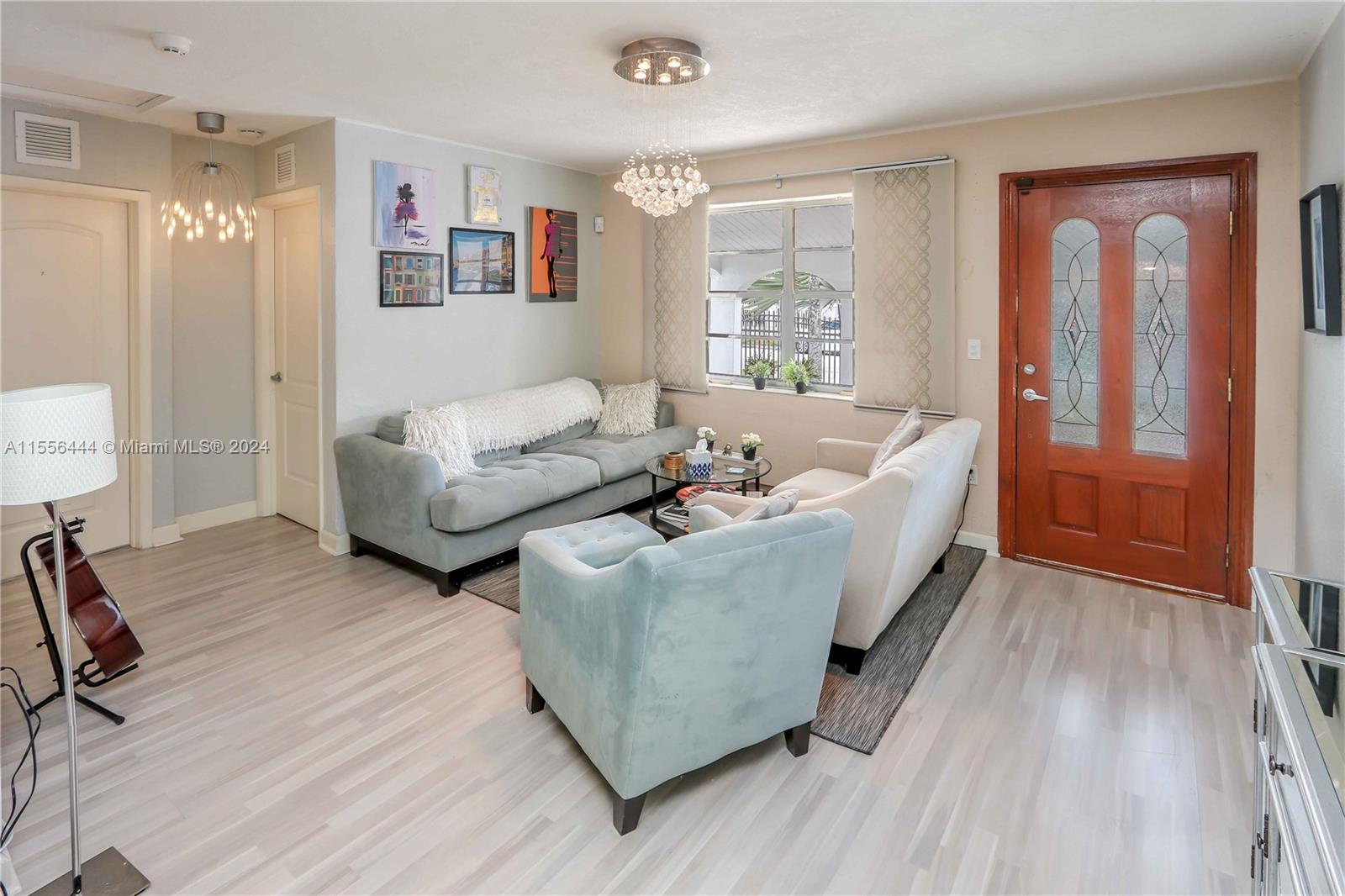 5635 Southwest 5th Terrace Miami, FL 33134 - Photo 10 of 28 a living room with furniture and a window