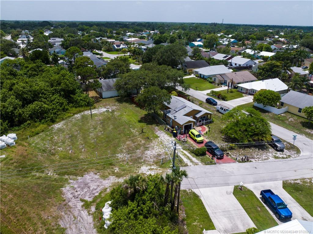 Tbd Southeast Primrose Way Stuart, FL 34997 - Photo 3 of 7 a view of a lake with a yard