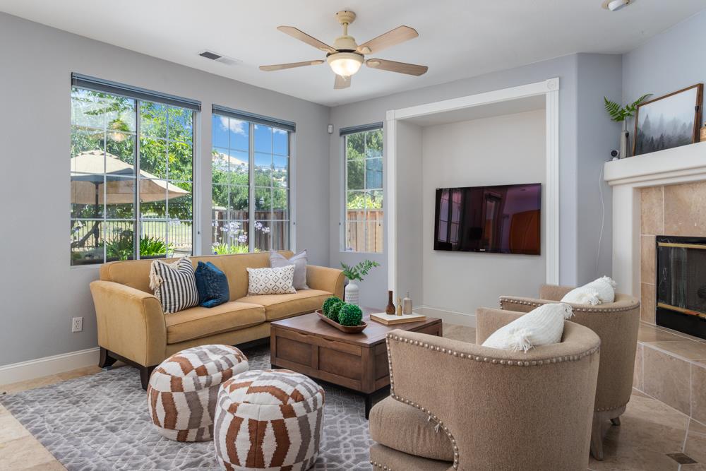 30152 Bridgeview Way Hayward, CA 94544 - Photo 11 of 37 a living room with furniture and a fireplace