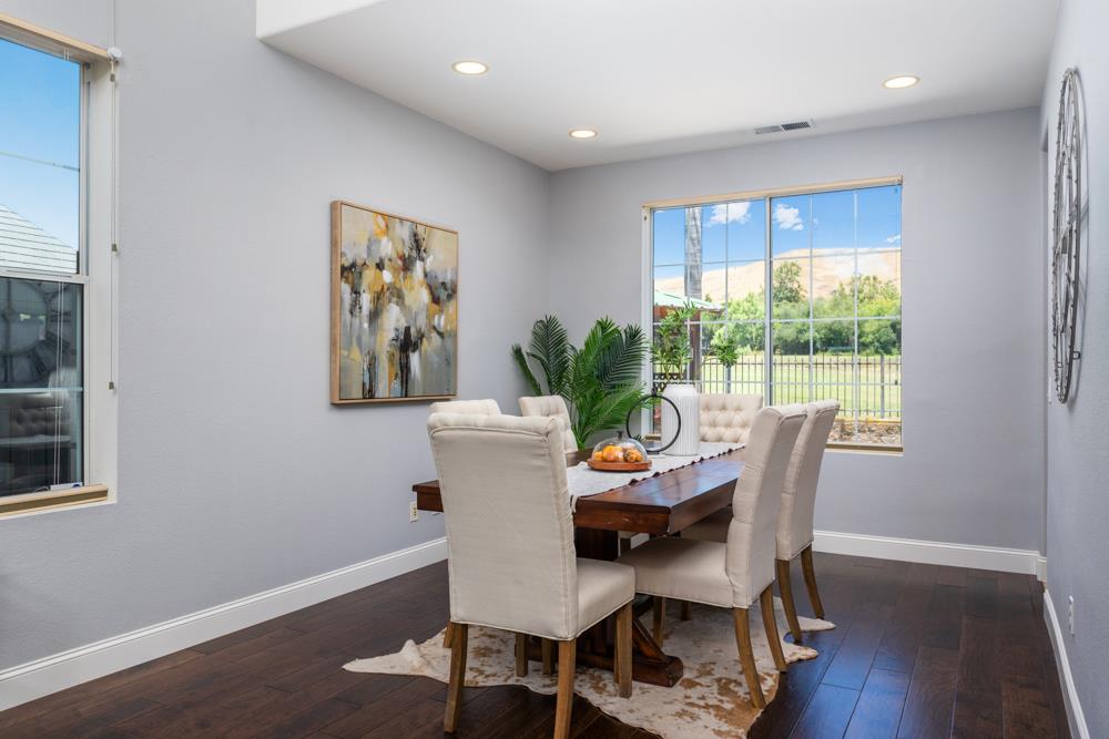 30152 Bridgeview Way Hayward, CA 94544 - Photo 8 of 37 a view of a dining room with furniture window and wooden floor