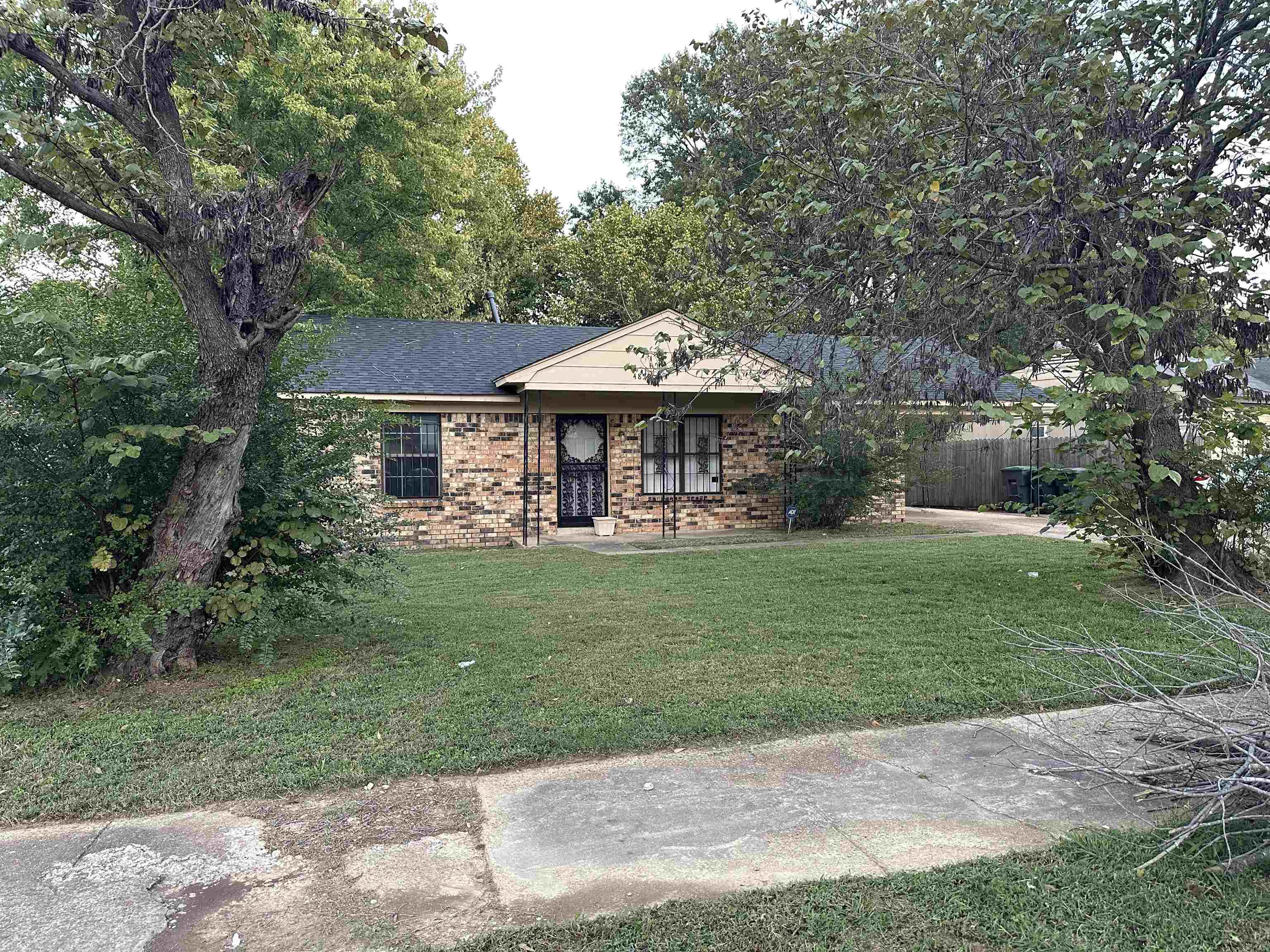 4850 Applestone Street Memphis, TN 38109 - Photo 1 of 9 a view of a house with a yard