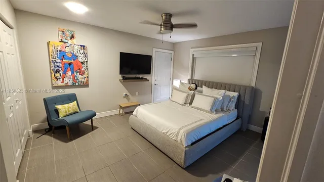 a kitchen with stainless steel appliances a stove microwave and refrigerator