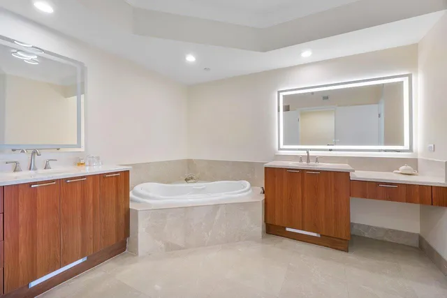 a bathroom with a shower and a sink