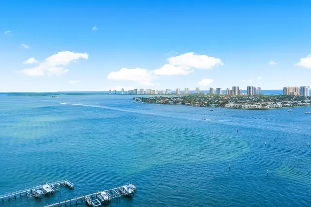 a view of a patio with a table and chairs