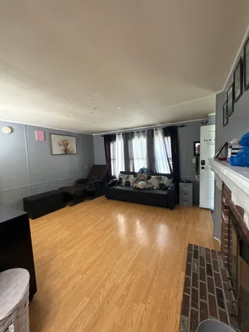 a room with pool table and flat screen tv