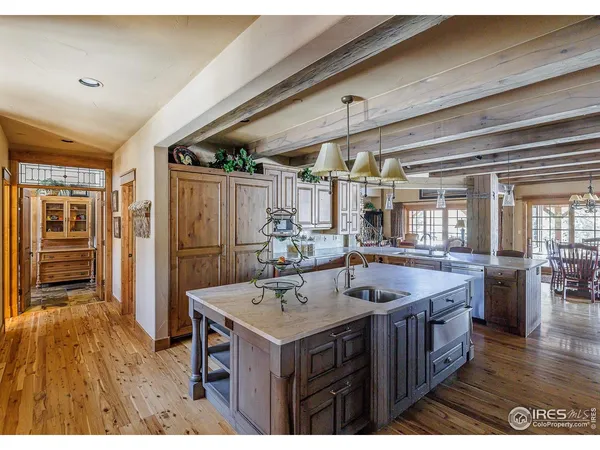 a kitchen that has a lot of cabinets in it
