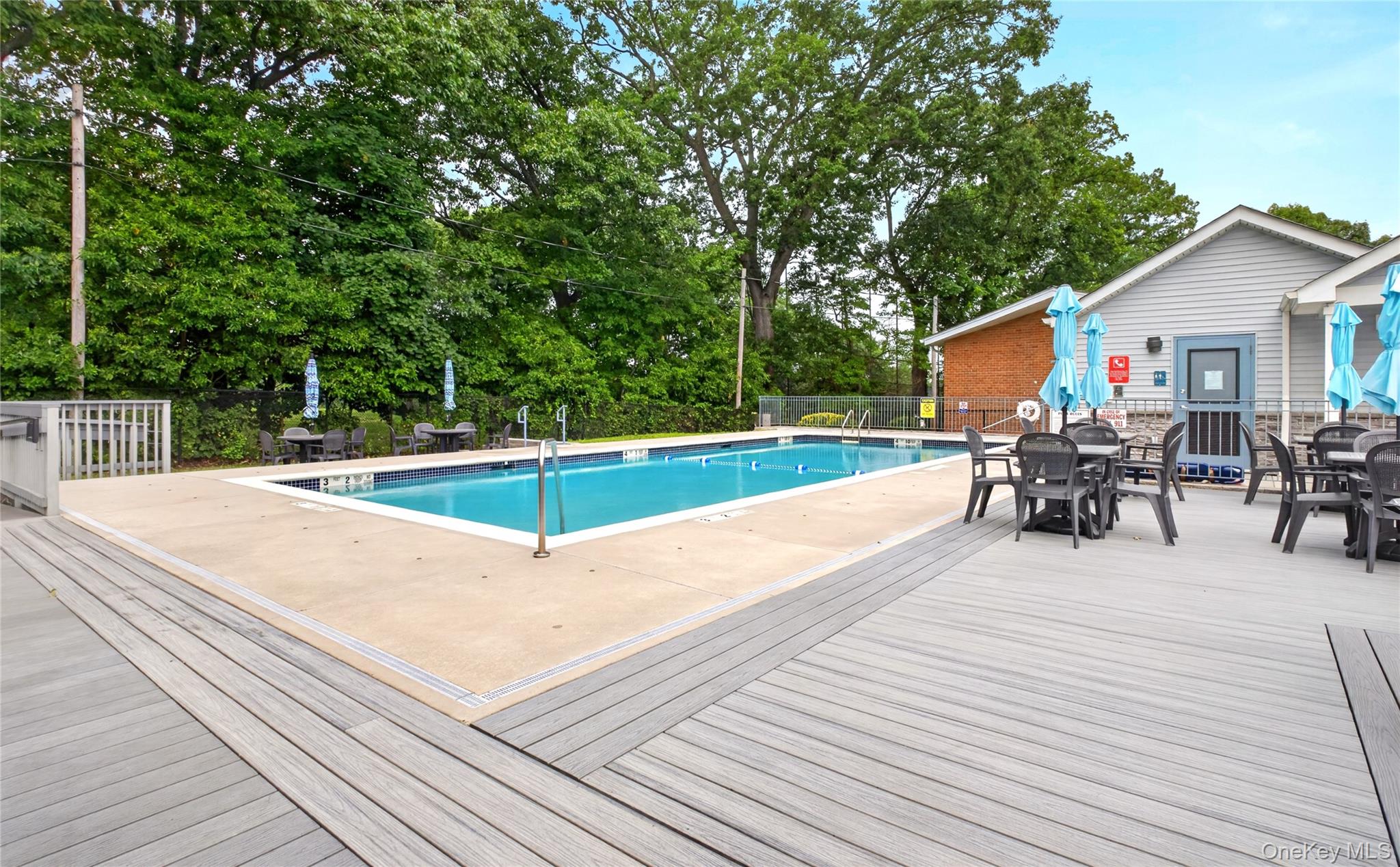 671 Pelham Road, Unit D9 New Rochelle, NY 10805 - Photo 12 of 14 New decking at pool area.